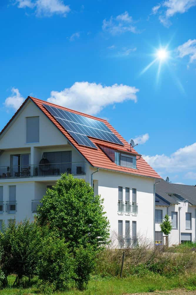 house with solar panel in a sunny day