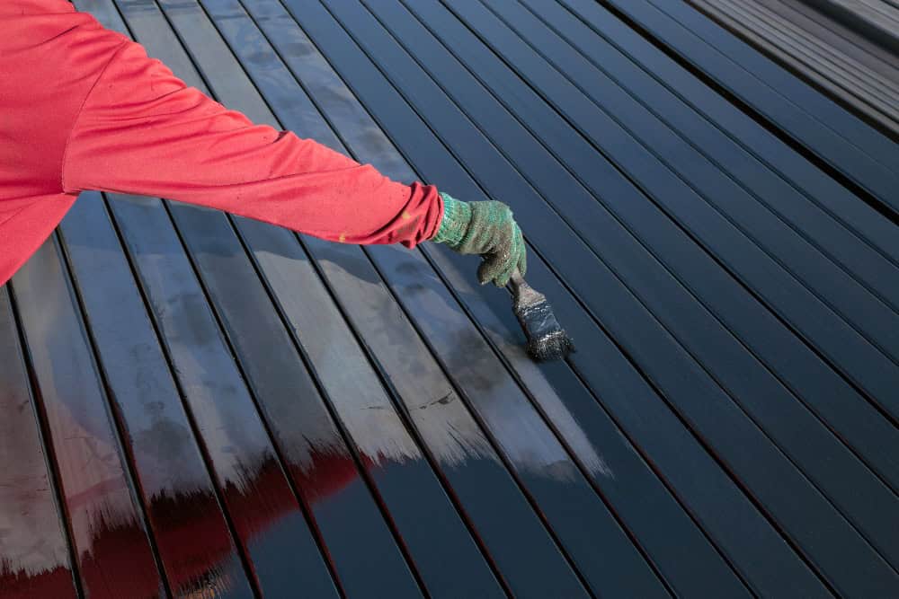 workers painting roof